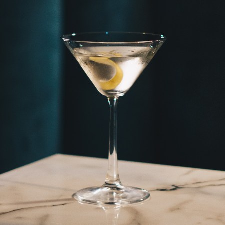 A martini with a lemon twist