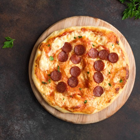 Pi Day Pizza. Homemade Pepperoni and Cheese Pizza for Pi Day Event